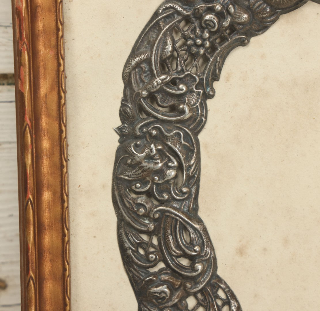 Lot 022 - Antique Sterling Silver Repoussé Gothic Revival Art Nouveau Frame Front With Numerous Green Man Motifs, Framed Behind Glass, Approximately 2.8 Troy Ounces