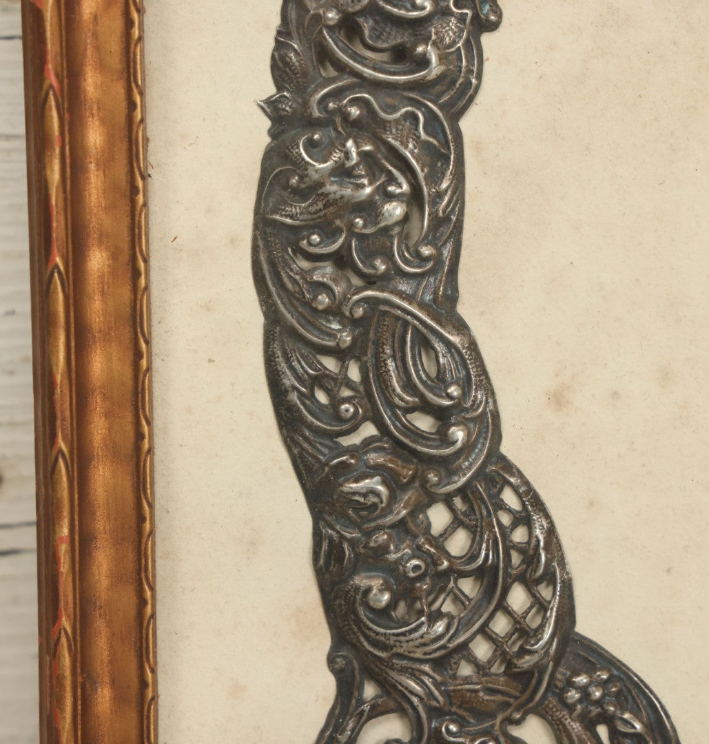 Lot 022 - Antique Sterling Silver Repoussé Gothic Revival Art Nouveau Frame Front With Numerous Green Man Motifs, Framed Behind Glass, Approximately 2.8 Troy Ounces