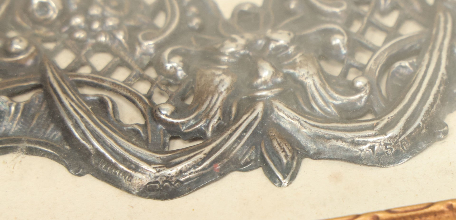 Lot 022 - Antique Sterling Silver Repoussé Gothic Revival Art Nouveau Frame Front With Numerous Green Man Motifs, Framed Behind Glass, Approximately 2.8 Troy Ounces