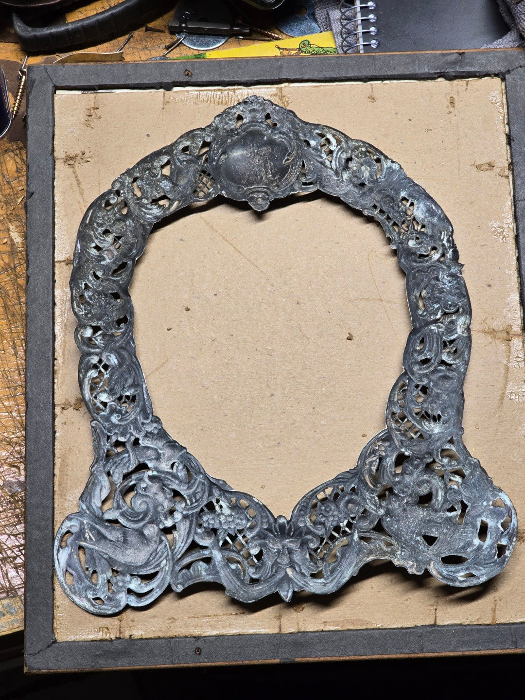 Lot 022 - Antique Sterling Silver Repoussé Gothic Revival Art Nouveau Frame Front With Numerous Green Man Motifs, Framed Behind Glass, Approximately 2.8 Troy Ounces