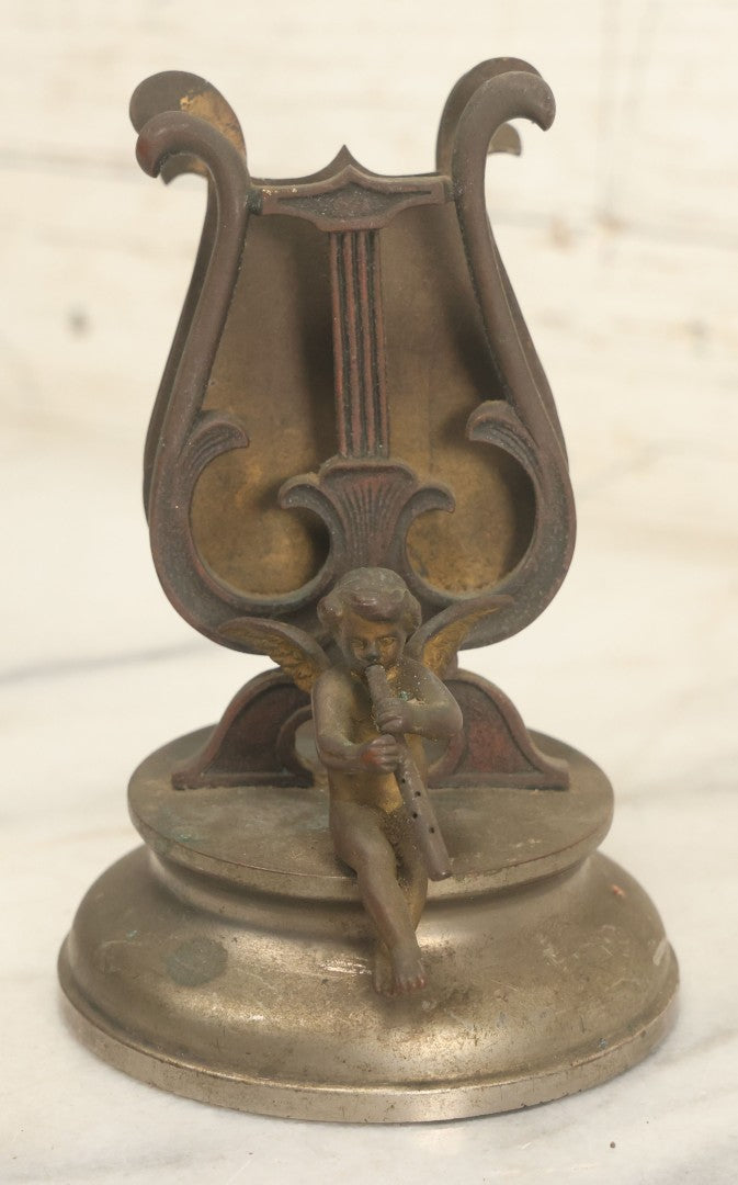 Lot 023 - Antique Figural Sheet Music Or Letter Holder With Cherub Playing Flute Motif, Cast Spelter / Brass