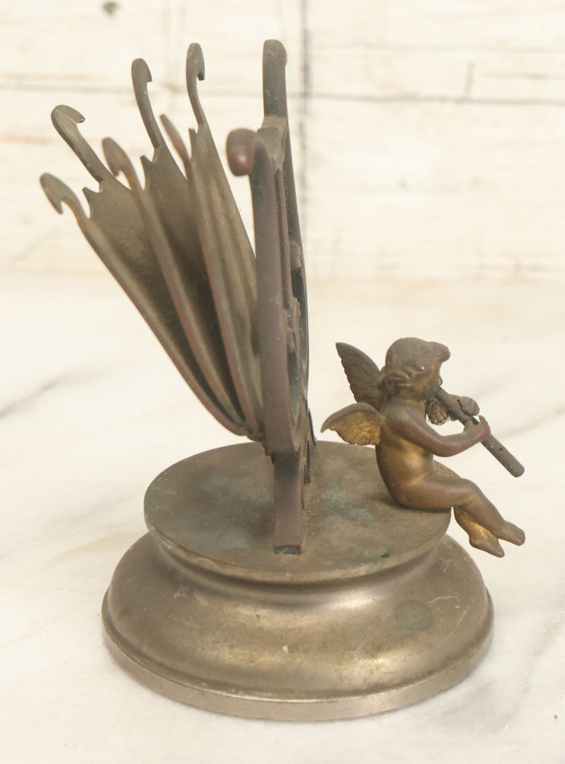 Lot 023 - Antique Figural Sheet Music Or Letter Holder With Cherub Playing Flute Motif, Cast Spelter / Brass