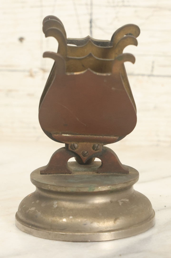 Lot 023 - Antique Figural Sheet Music Or Letter Holder With Cherub Playing Flute Motif, Cast Spelter / Brass