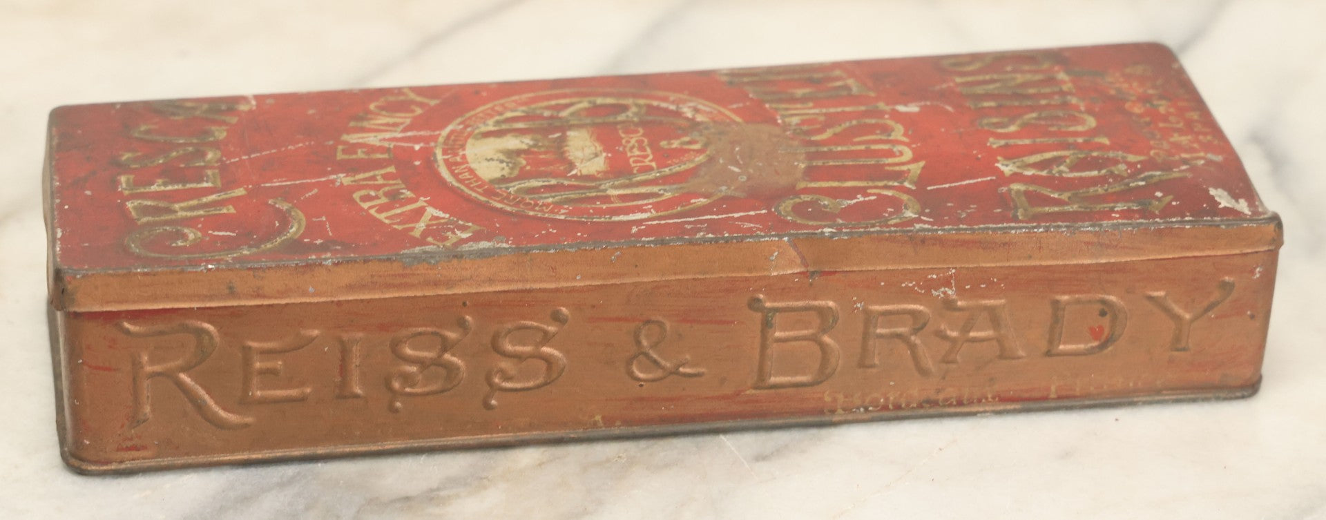 Lot 026 - Antique Reiss & Brady Cresca Extra Fancy Cluster Raisins Embossed Tin, New York And Bordeaux, Packed In Malaga Spain, 