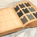 Lot 031 - Antique Sample Fabric Wool Swatch Book From Calumet Woolen Co., Styles No. And/Or Great River Woolen Co., Styles No. 6107-7785, Containing Dozens Of Fabric Samples, Missing Spine Covering, Circa 1894
