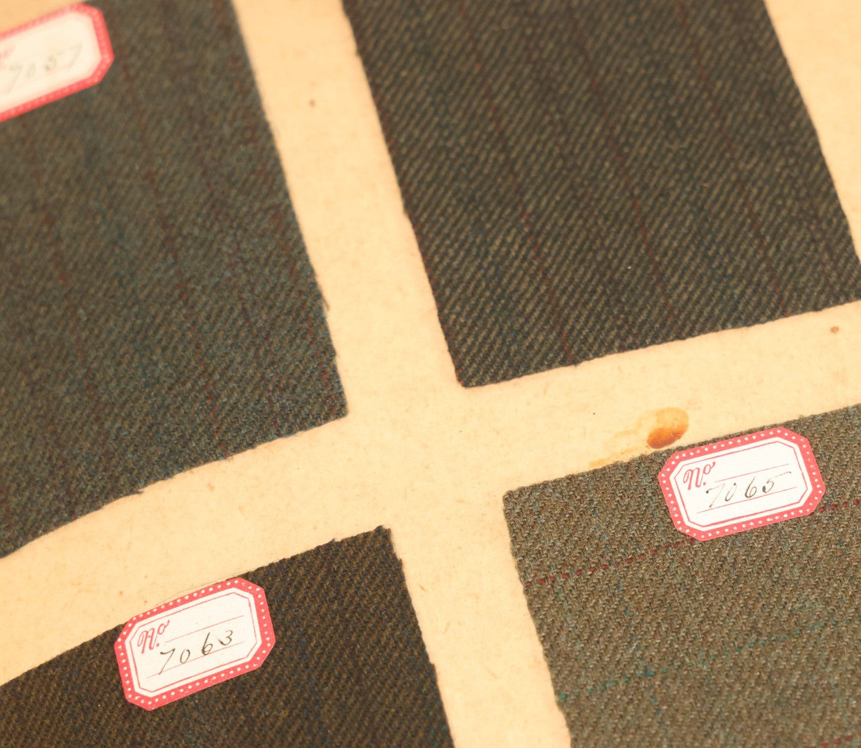 Lot 031 - Antique Sample Fabric Wool Swatch Book From Calumet Woolen Co., Styles No. And/Or Great River Woolen Co., Styles No. 6107-7785, Containing Dozens Of Fabric Samples, Missing Spine Covering, Circa 1894 