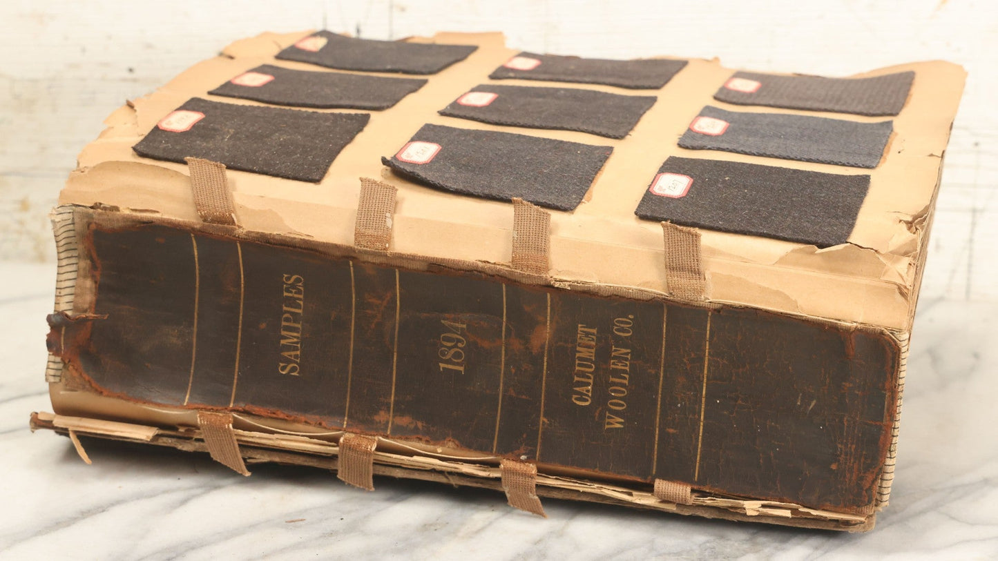 Lot 032 - Antique Sample Fabric Wool Swatch Book From Calumet Woolen Co., Styles No. 1195-1661 & Great River Woolen Co., Styles No. 1-1303, Containing Dozens Of Fabric Samples, Missing Front Cover, Dated 1894 