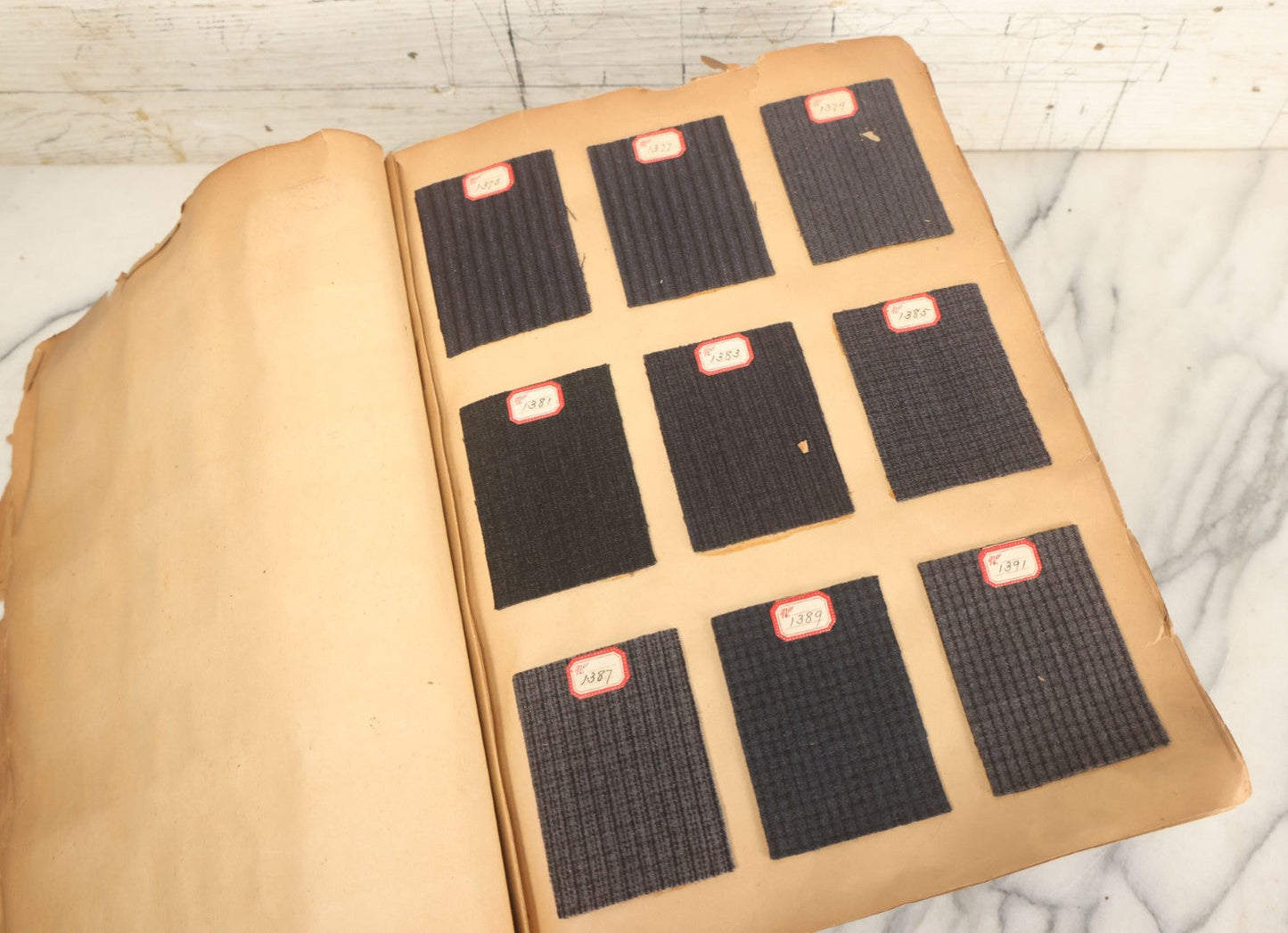 Lot 032 - Antique Sample Fabric Wool Swatch Book From Calumet Woolen Co., Styles No. 1195-1661 & Great River Woolen Co., Styles No. 1-1303, Containing Dozens Of Fabric Samples, Missing Front Cover, Dated 1894 