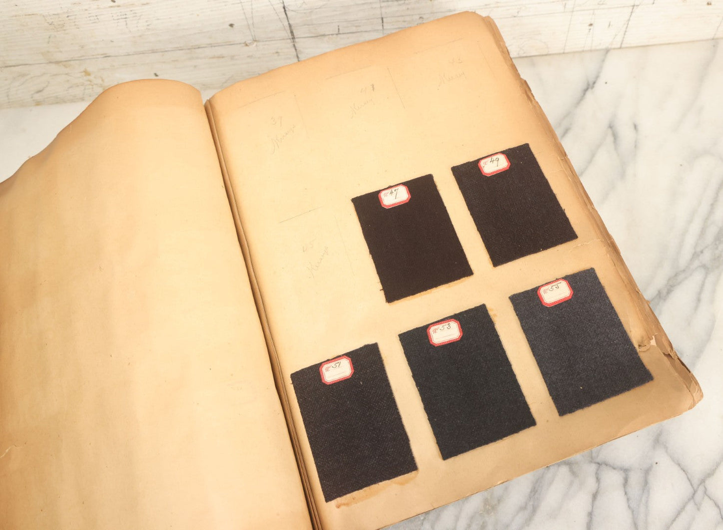 Lot 032 - Antique Sample Fabric Wool Swatch Book From Calumet Woolen Co., Styles No. 1195-1661 & Great River Woolen Co., Styles No. 1-1303, Containing Dozens Of Fabric Samples, Missing Front Cover, Dated 1894 