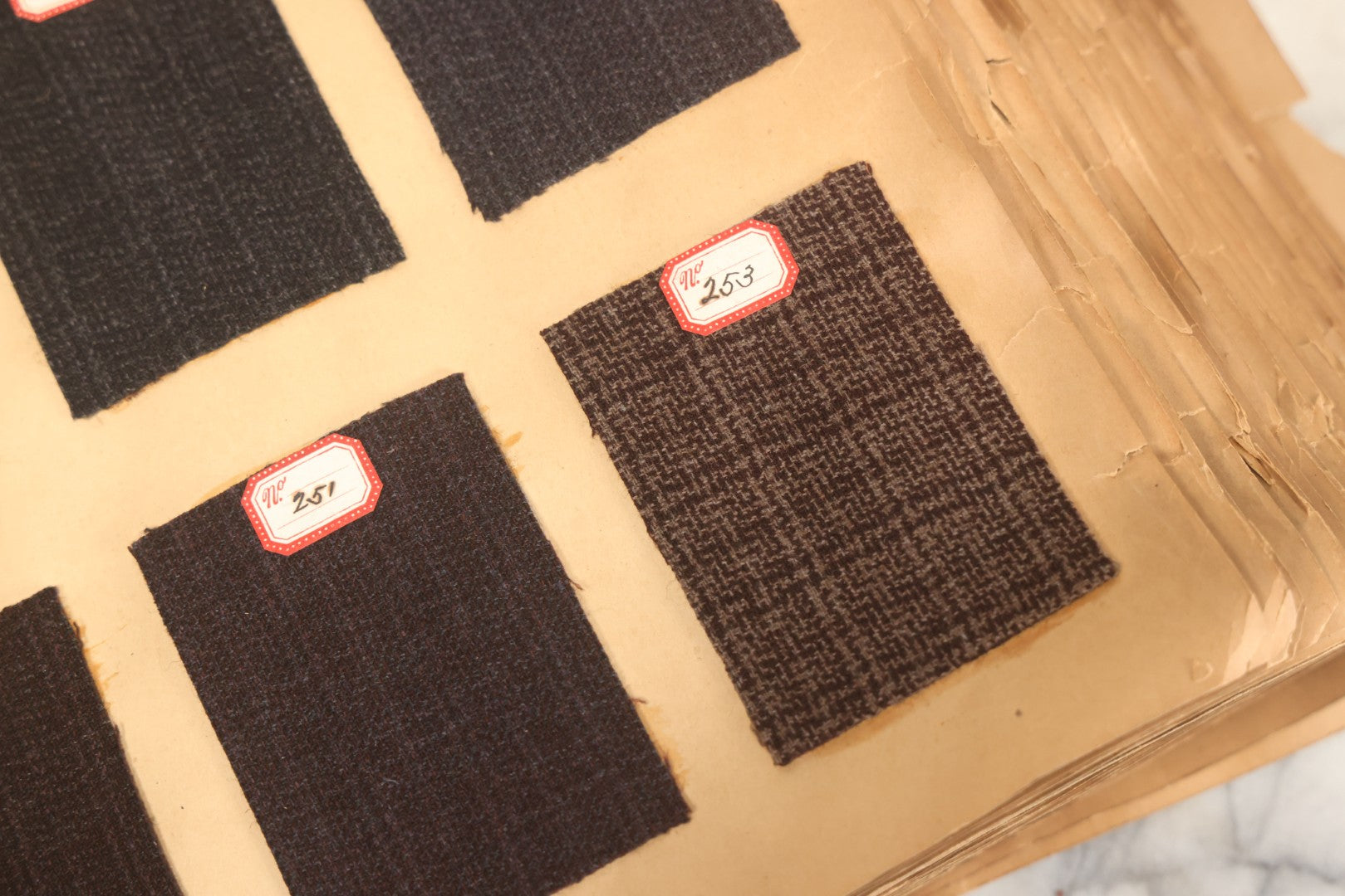 Lot 032 - Antique Sample Fabric Wool Swatch Book From Calumet Woolen Co., Styles No. 1195-1661 & Great River Woolen Co., Styles No. 1-1303, Containing Dozens Of Fabric Samples, Missing Front Cover, Dated 1894 