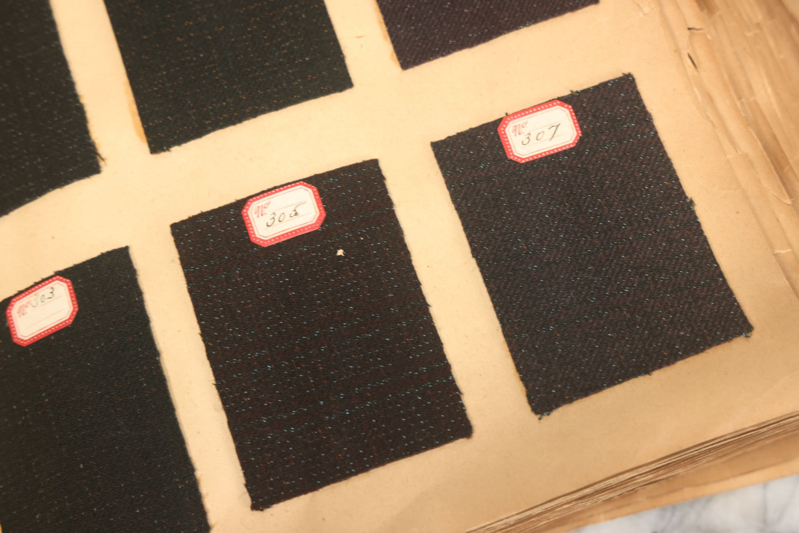 Lot 032 - Antique Sample Fabric Wool Swatch Book From Calumet Woolen Co., Styles No. 1195-1661 & Great River Woolen Co., Styles No. 1-1303, Containing Dozens Of Fabric Samples, Missing Front Cover, Dated 1894 