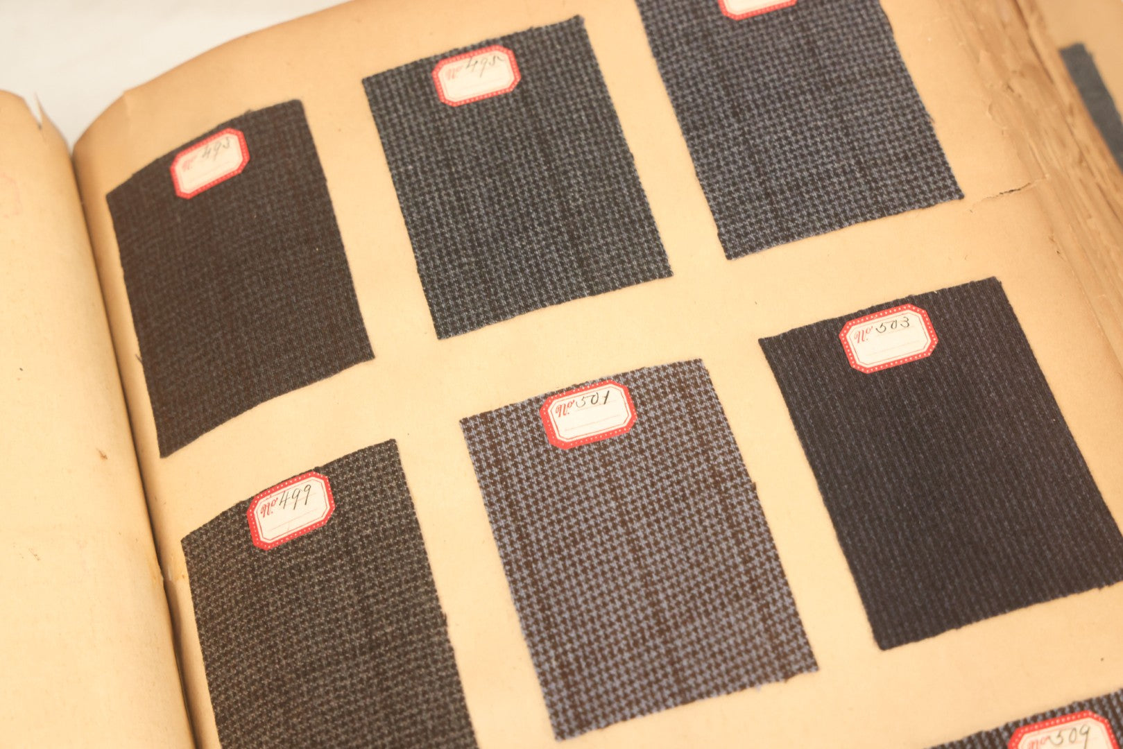 Lot 032 - Antique Sample Fabric Wool Swatch Book From Calumet Woolen Co., Styles No. 1195-1661 & Great River Woolen Co., Styles No. 1-1303, Containing Dozens Of Fabric Samples, Missing Front Cover, Dated 1894 