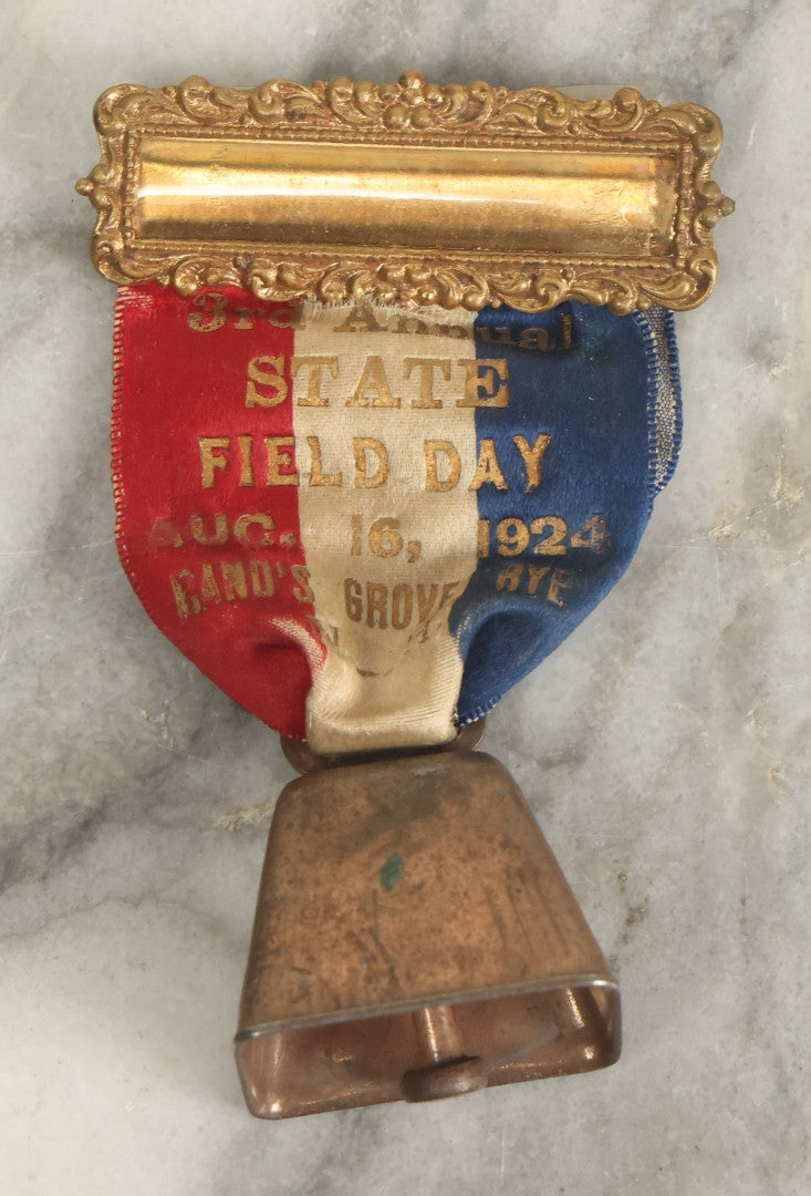 Lot 051 - Antique 3rd Annual State Field Day Red White And Blue Ribbon And Bell, Band's Grove, Rye, New Hampshire, August 16th, 1924