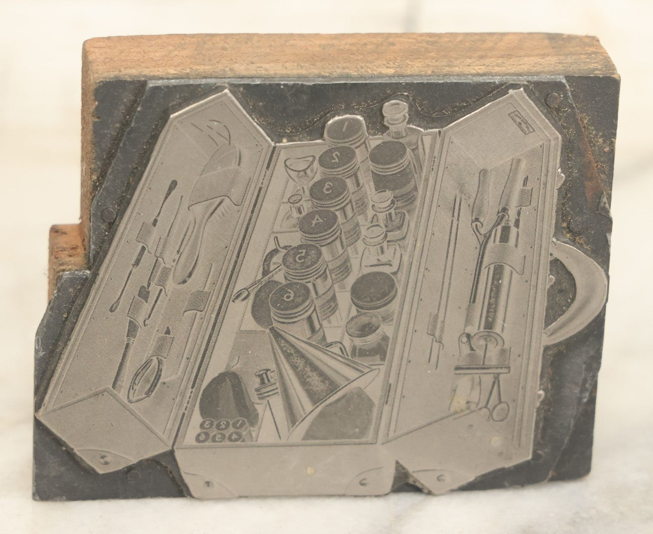 Lot 054 - Grouping Of Four Antique Or Vintage Printing Blocks Including Patriarchal Cross, Esoteric Priest, Toolkit With Hair Care Implements, And "Second Request"