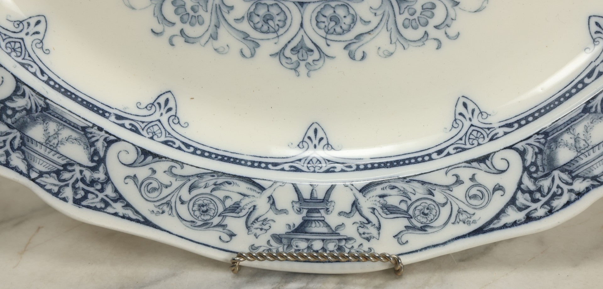 Lot 064 - Vintage Wedgwood Neoclassical Revival Transferware Platter With Griffin Motif, Greco-Roman Architectural Elements, Urns, Circa 1932, 17-1/4" x 13-1/2"