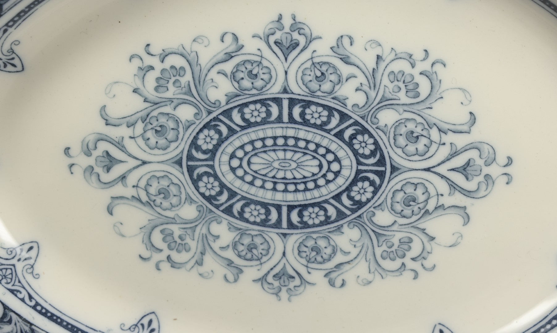 Lot 064 - Vintage Wedgwood Neoclassical Revival Transferware Platter With Griffin Motif, Greco-Roman Architectural Elements, Urns, Circa 1932, 17-1/4" x 13-1/2"