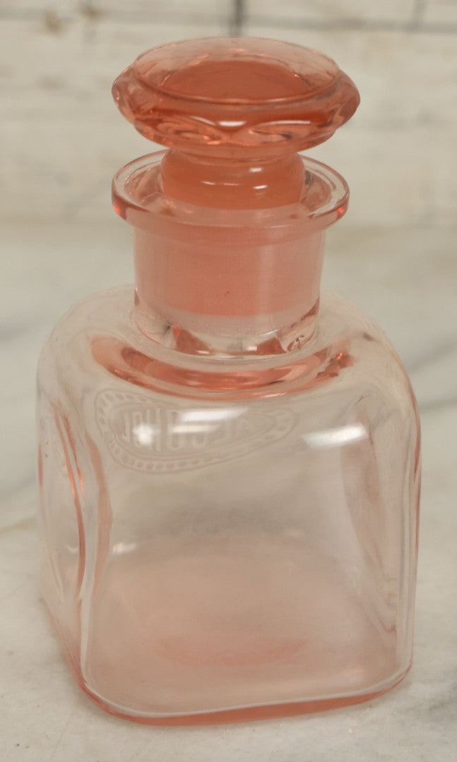 Lot 065 - Pair Of Antique Pink Depression Glass Etched Vanity Bathroom Jars With Stoppers, Alcohol And Mouthwash, 4-3/8" Height Each