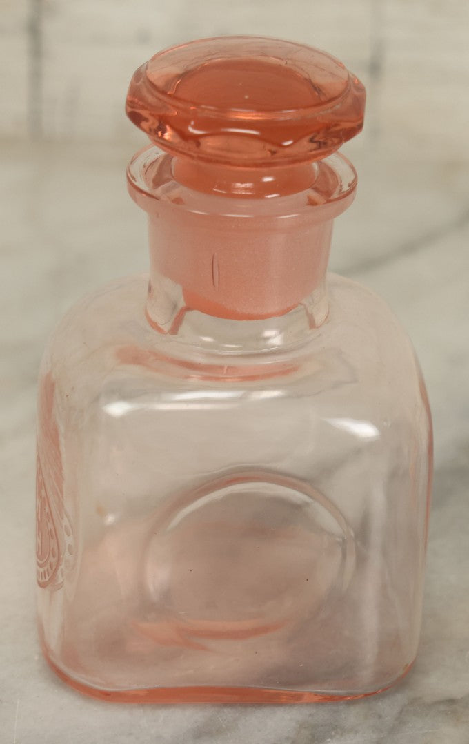 Lot 065 - Pair Of Antique Pink Depression Glass Etched Vanity Bathroom Jars With Stoppers, Alcohol And Mouthwash, 4-3/8" Height Each