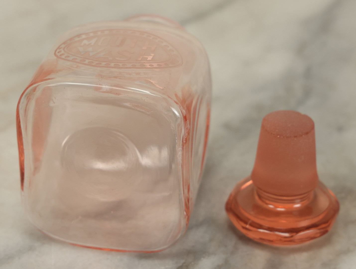Lot 065 - Pair Of Antique Pink Depression Glass Etched Vanity Bathroom Jars With Stoppers, Alcohol And Mouthwash, 4-3/8" Height Each