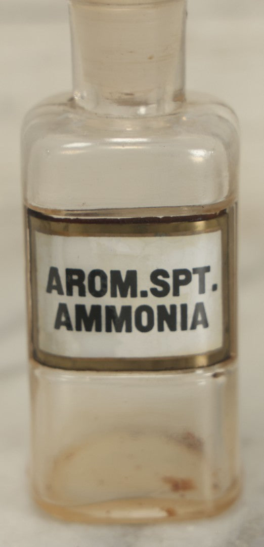 Lot 068 - Antique Glass Aromatic Spirit Of Ammonia (Arom. Spt. Ammonia) Apothecary Bottle With Reverse Painted Glass Label, Patented April 2, 1889, 4-1/2" Height
