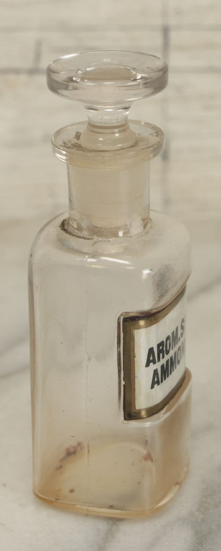 Lot 068 - Antique Glass Aromatic Spirit Of Ammonia (Arom. Spt. Ammonia) Apothecary Bottle With Reverse Painted Glass Label, Patented April 2, 1889, 4-1/2" Height