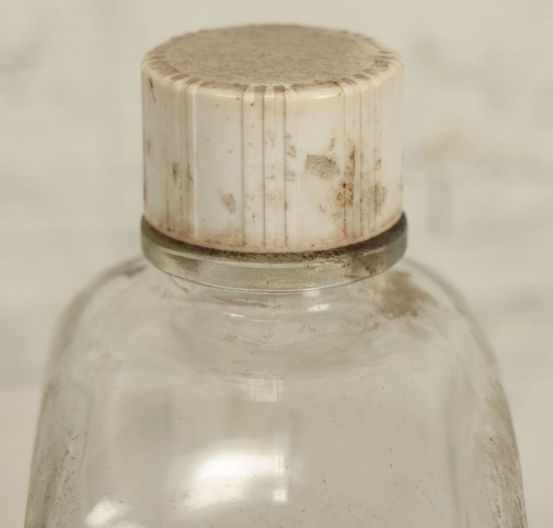 Lot 069 - Vintage Glass Pharmacy Jar Jug Bottle With Applied Paper Label, Completely Denatured Alcohol, Poison: Caution! With Skull And Crossbones, 7-5/8" Height