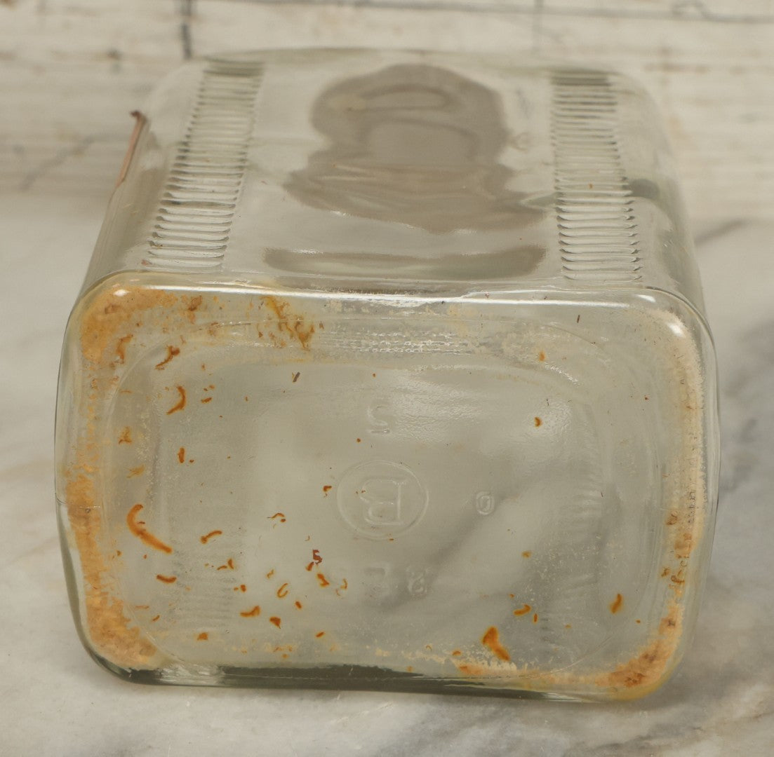 Lot 069 - Vintage Glass Pharmacy Jar Jug Bottle With Applied Paper Label, Completely Denatured Alcohol, Poison: Caution! With Skull And Crossbones, 7-5/8" Height