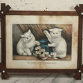 Lot 070 - "My Little White Kitties, Playing Dominoes" Antique Hand Colored Lithograph Published By Currier & Ives, In Original Period Frame With Mil Glass Adornments, Note Water Damage, Foxing, Warping, Overall Dimensions 20-3/8" x 16-3/8"