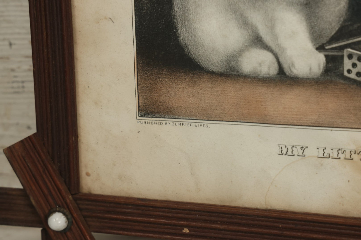 Lot 070 - "My Little White Kitties, Playing Dominoes" Antique Hand Colored Lithograph Published By Currier & Ives, In Original Period Frame With Mil Glass Adornments, Note Water Damage, Foxing, Warping, Overall Dimensions 20-3/8" x 16-3/8"