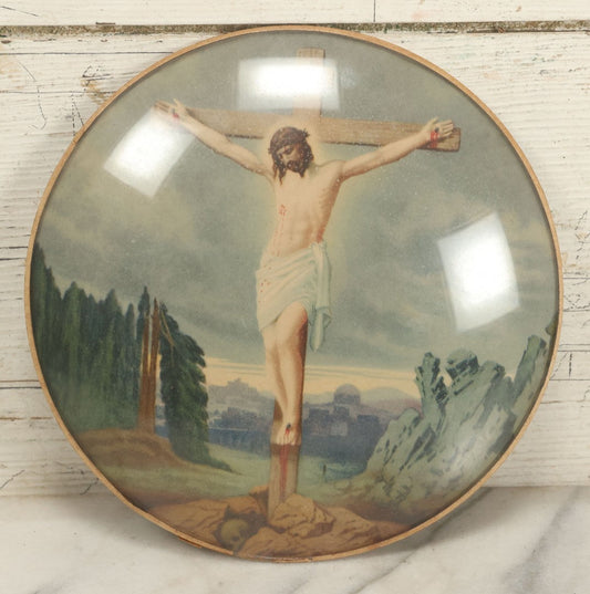 Lot 085 - Vintage Crucifixion Print, Jesus On The Cross, With Skull And Crossbones, Skull Of Adam, At Jesus' Feet, In Circular Bubble Glass Frame, Hand Made By Peter Watson's Studio, 9" Diameter
