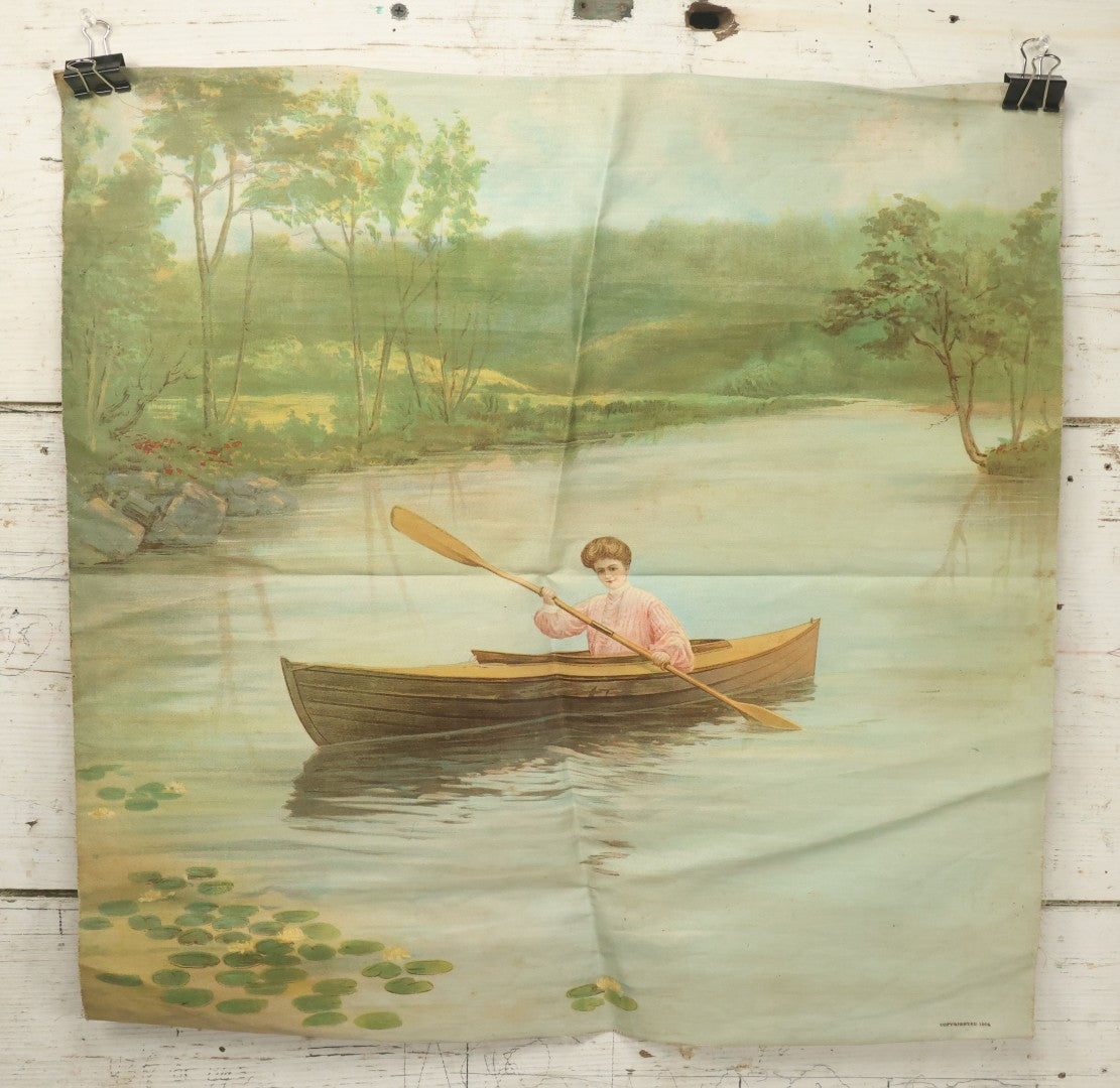 Lot 004 - Antique Lithograph On Linen Of A Woman Canoeing, Copyright 1904, 22-3/4" x 23"