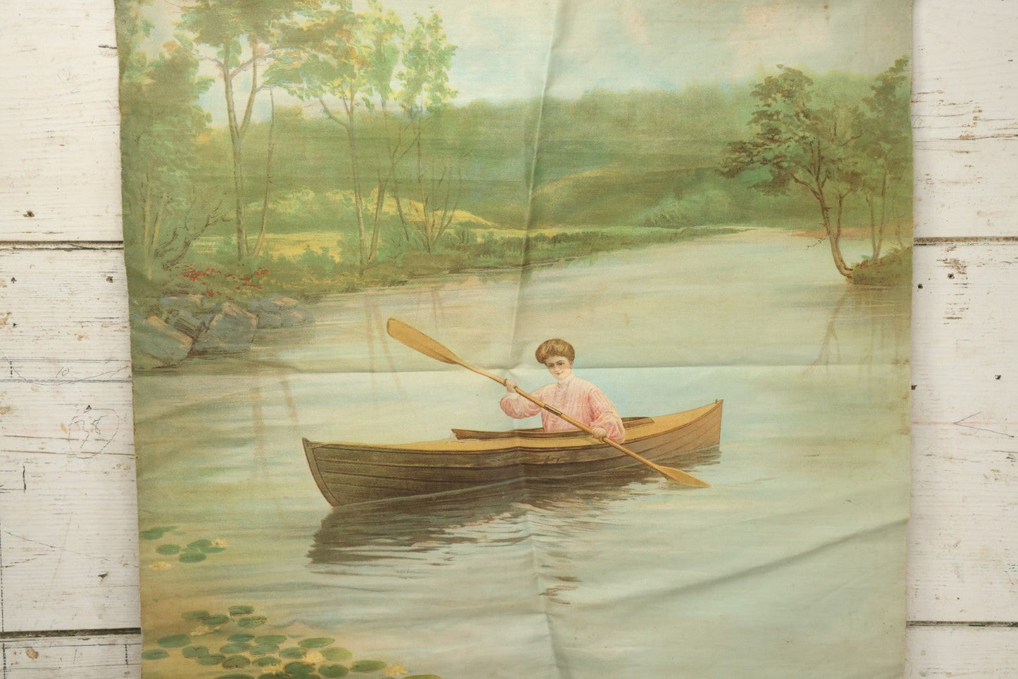 Lot 004 - Antique Lithograph On Linen Of A Woman Canoeing, Copyright 1904, 22-3/4" x 23"