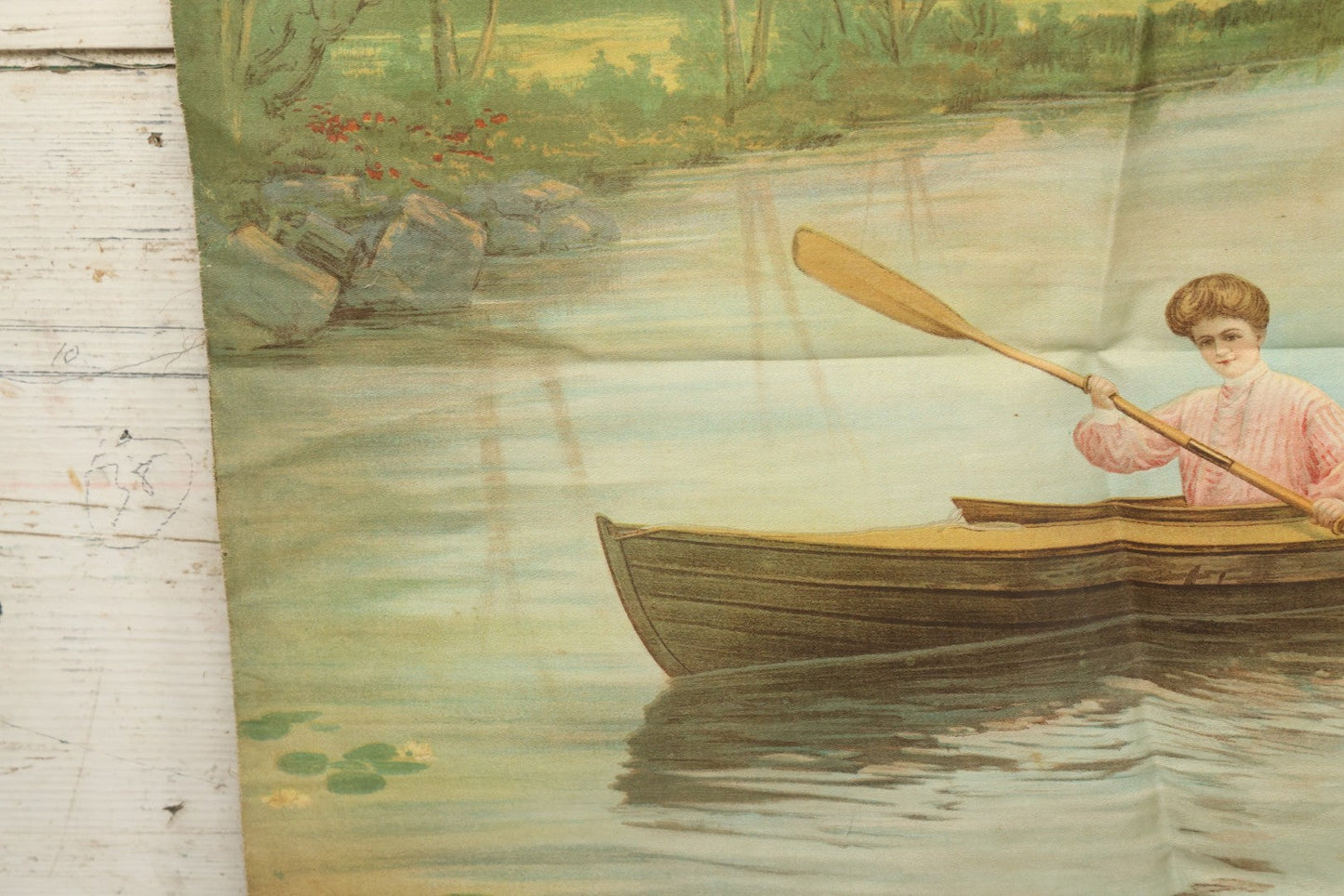 Lot 004 - Antique Lithograph On Linen Of A Woman Canoeing, Copyright 1904, 22-3/4" x 23"