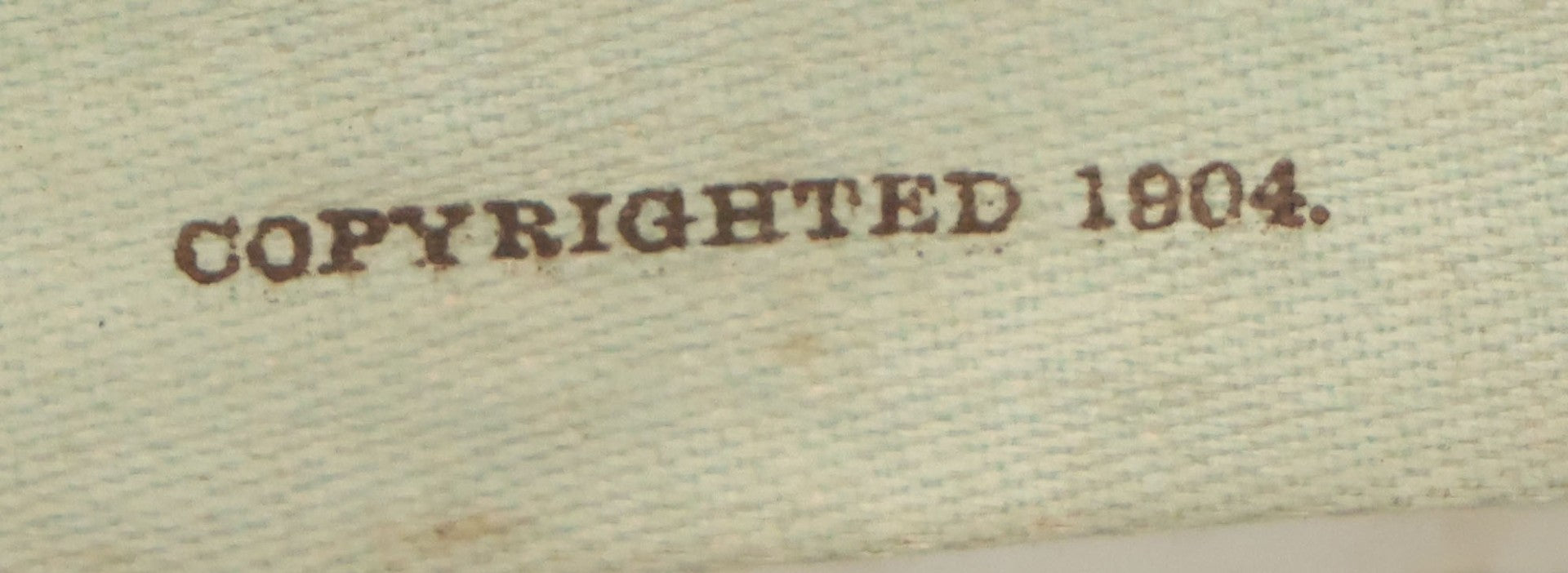 Lot 004 - Antique Lithograph On Linen Of A Woman Canoeing, Copyright 1904, 22-3/4" x 23"