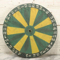 Lot 022 - Vintage Folk Art Carnival Spinning Game Wheel In Yellow, Black, And Green Paint, Hand Painted, As Found, 14-3/4" Diameter