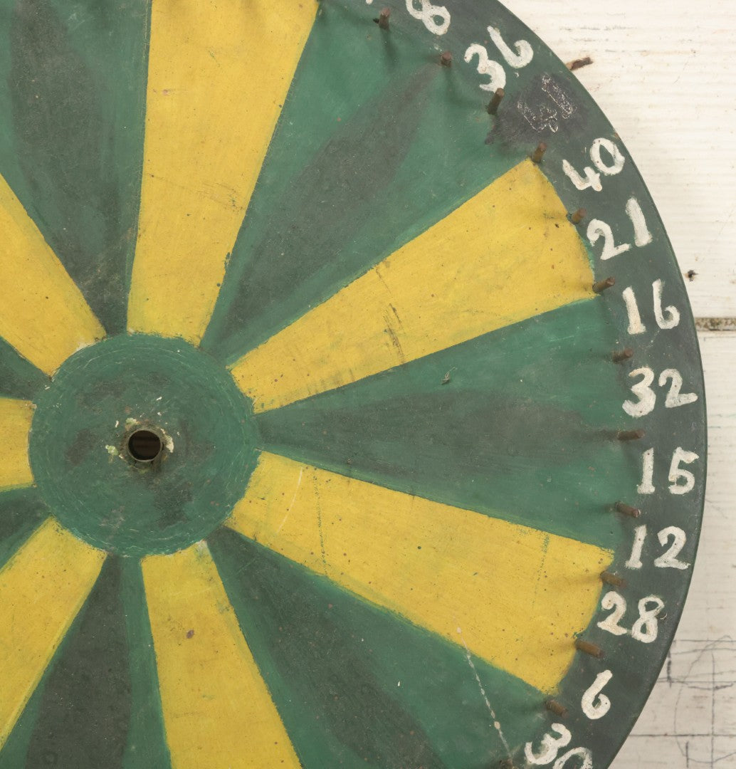 Lot 022 - Vintage Folk Art Carnival Spinning Game Wheel In Yellow, Black, And Green Paint, Hand Painted, As Found, 14-3/4" Diameter