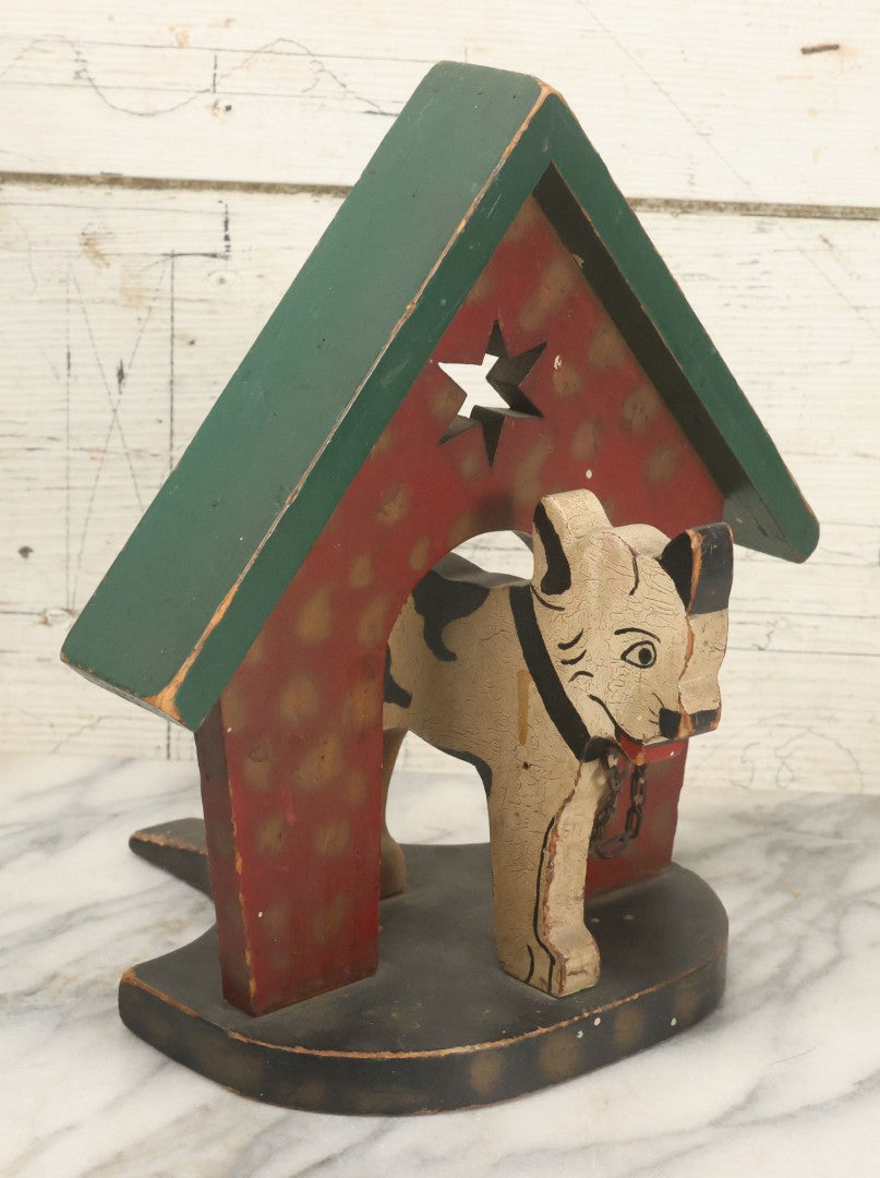 Lot 023 - Vintage Folk Art Boston Terrier Hand Painted, Hand Cut Wooden Door Stop With Red House, Green Roof, Star Cutout