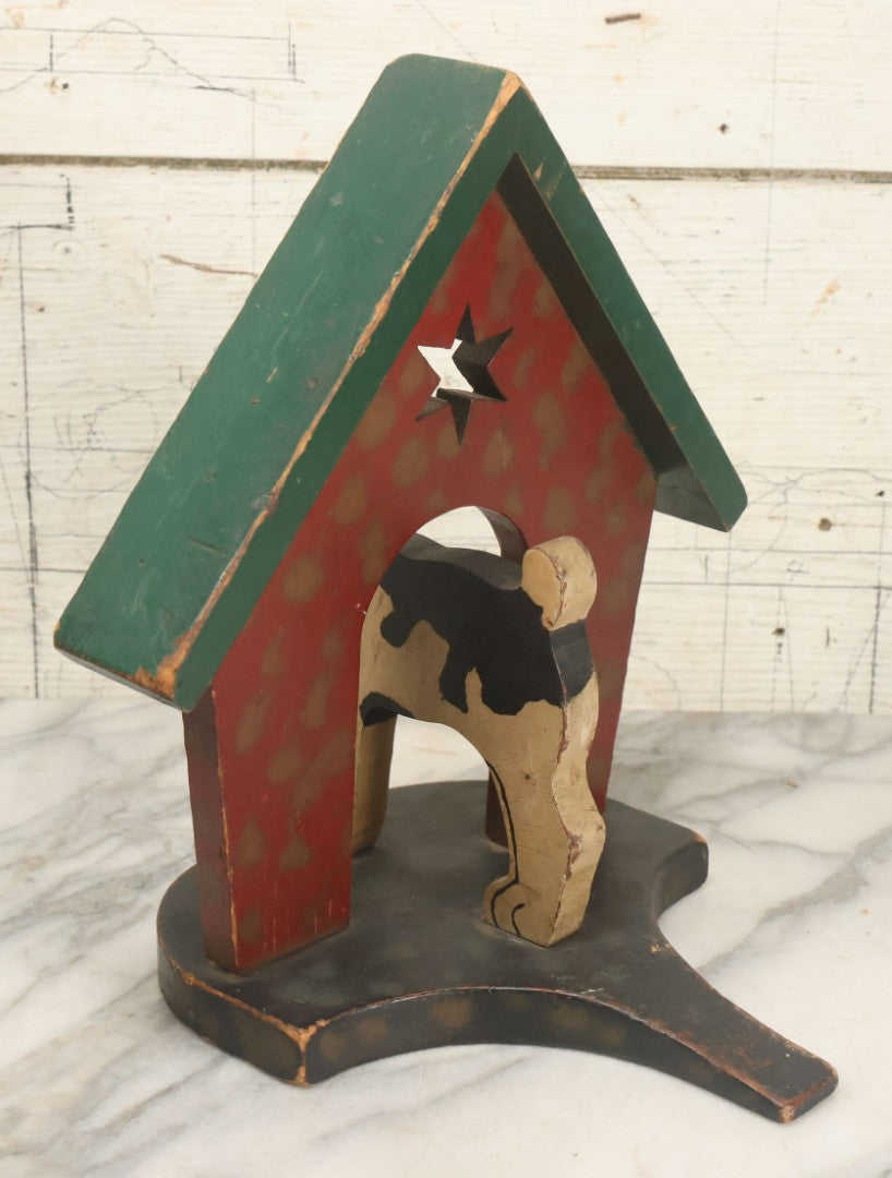 Lot 023 - Vintage Folk Art Boston Terrier Hand Painted, Hand Cut Wooden Door Stop With Red House, Green Roof, Star Cutout