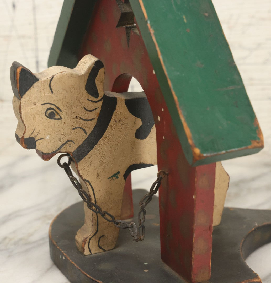 Lot 023 - Vintage Folk Art Boston Terrier Hand Painted, Hand Cut Wooden Door Stop With Red House, Green Roof, Star Cutout