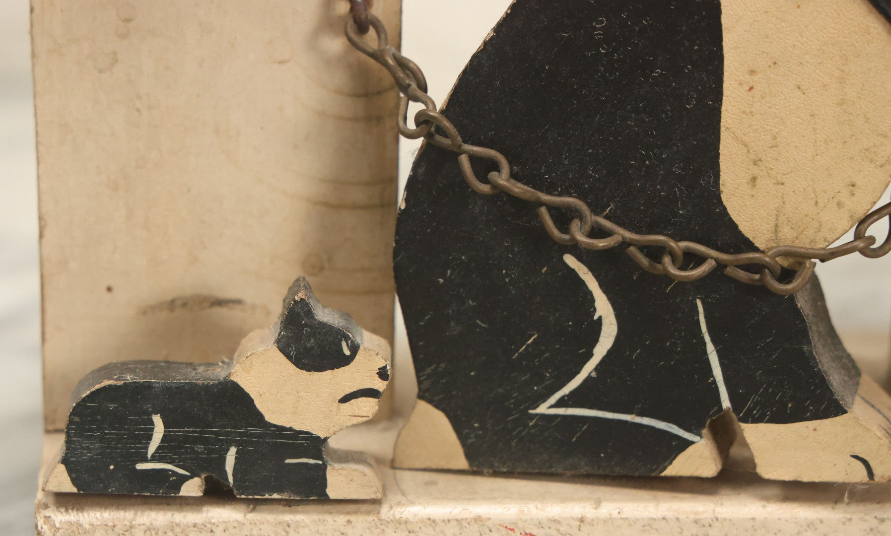 Lot 024 - Vintage Folk Art Boston Terrier Hand Painted, Hand Cut Wooden Door Stop With White House, Red Roof, Dog With Two Puppies