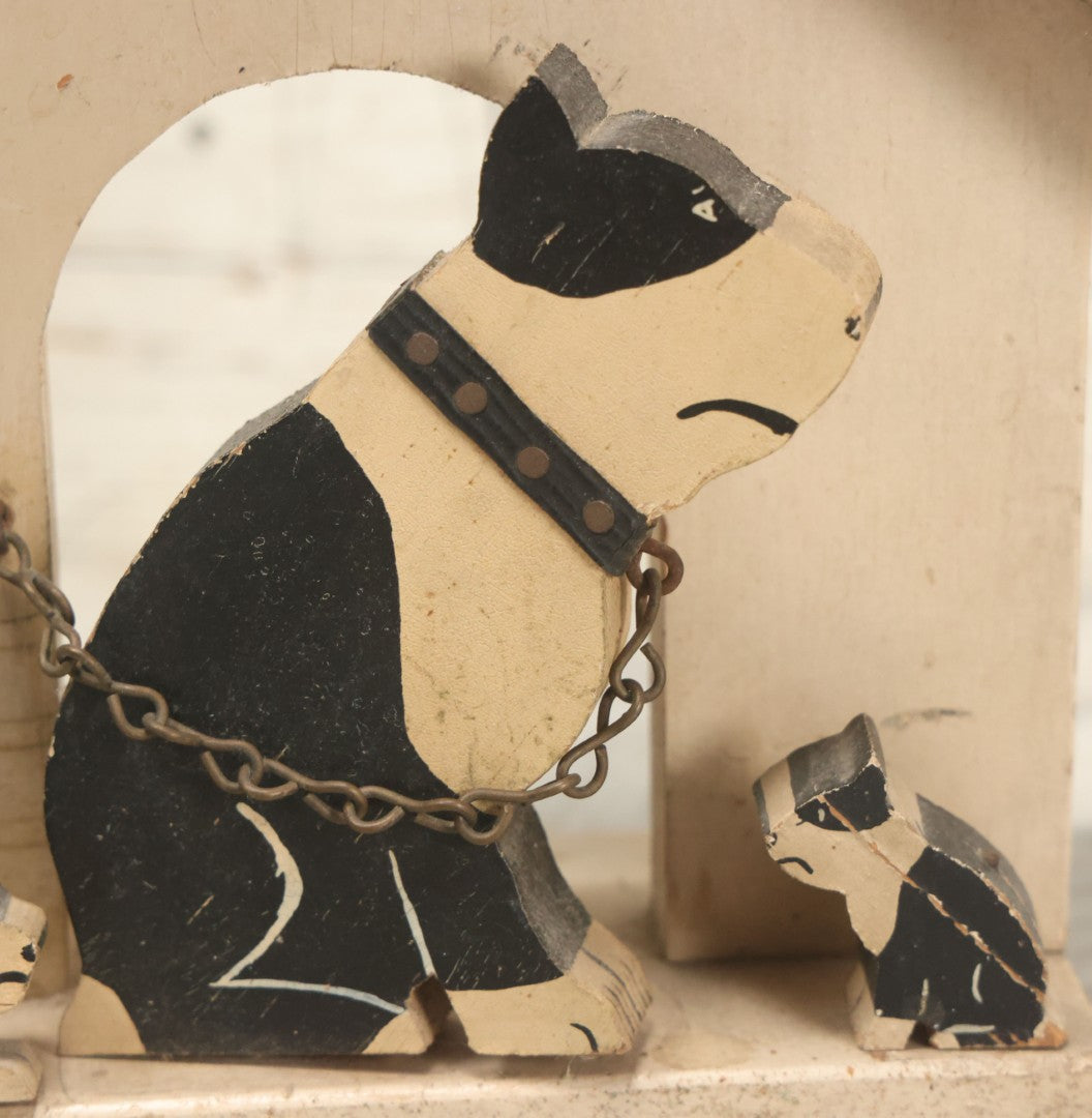 Lot 024 - Vintage Folk Art Boston Terrier Hand Painted, Hand Cut Wooden Door Stop With White House, Red Roof, Dog With Two Puppies