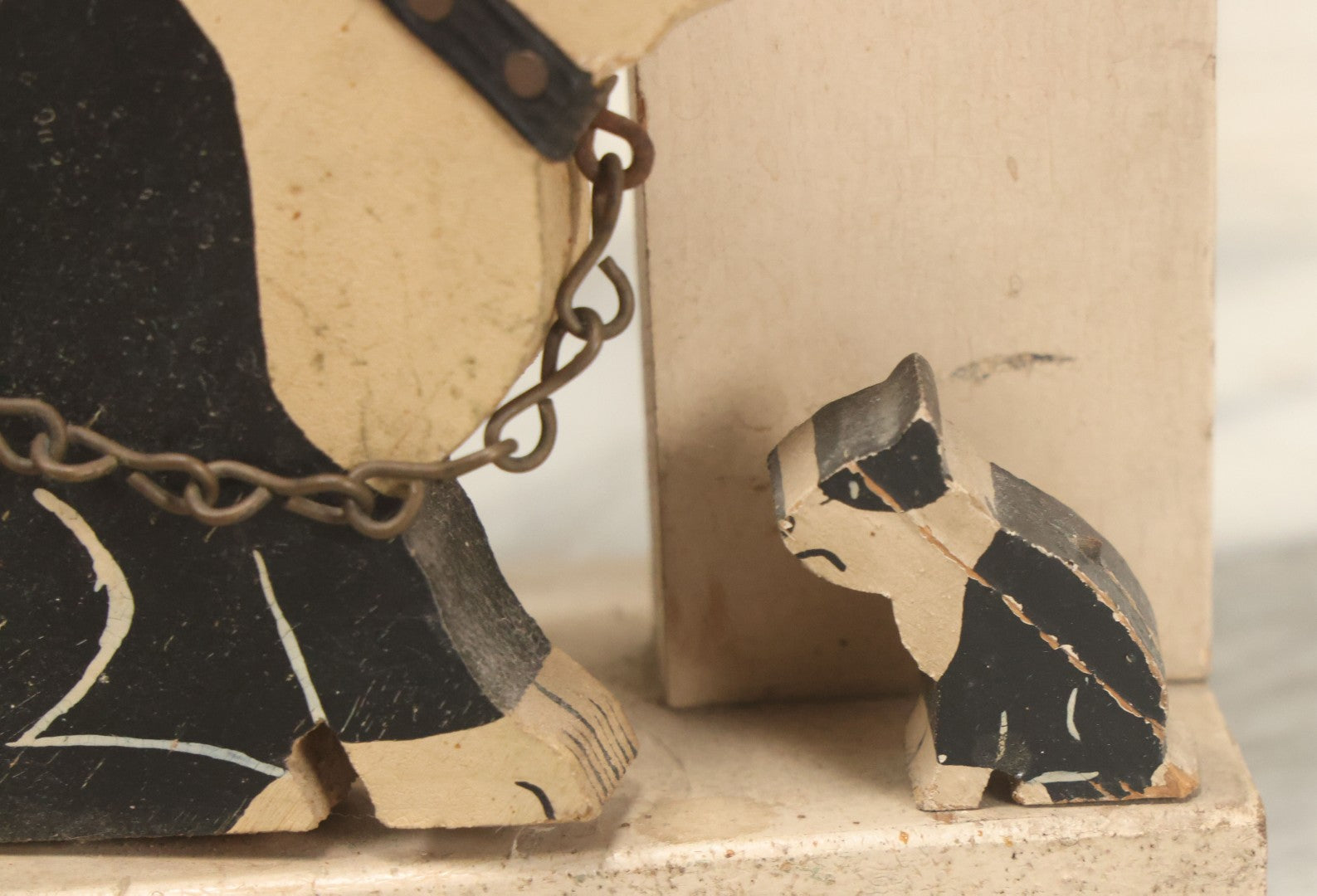 Lot 024 - Vintage Folk Art Boston Terrier Hand Painted, Hand Cut Wooden Door Stop With White House, Red Roof, Dog With Two Puppies