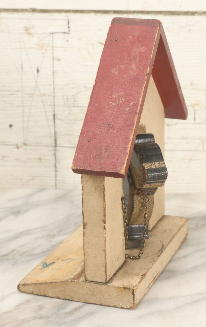 Lot 025 - Vintage Folk Art Boston Terrier Hand Painted, Hand Cut Wooden Door Stop With White House, Red Roof, Single Dog With Collar And Chain, Note Damaged Foot