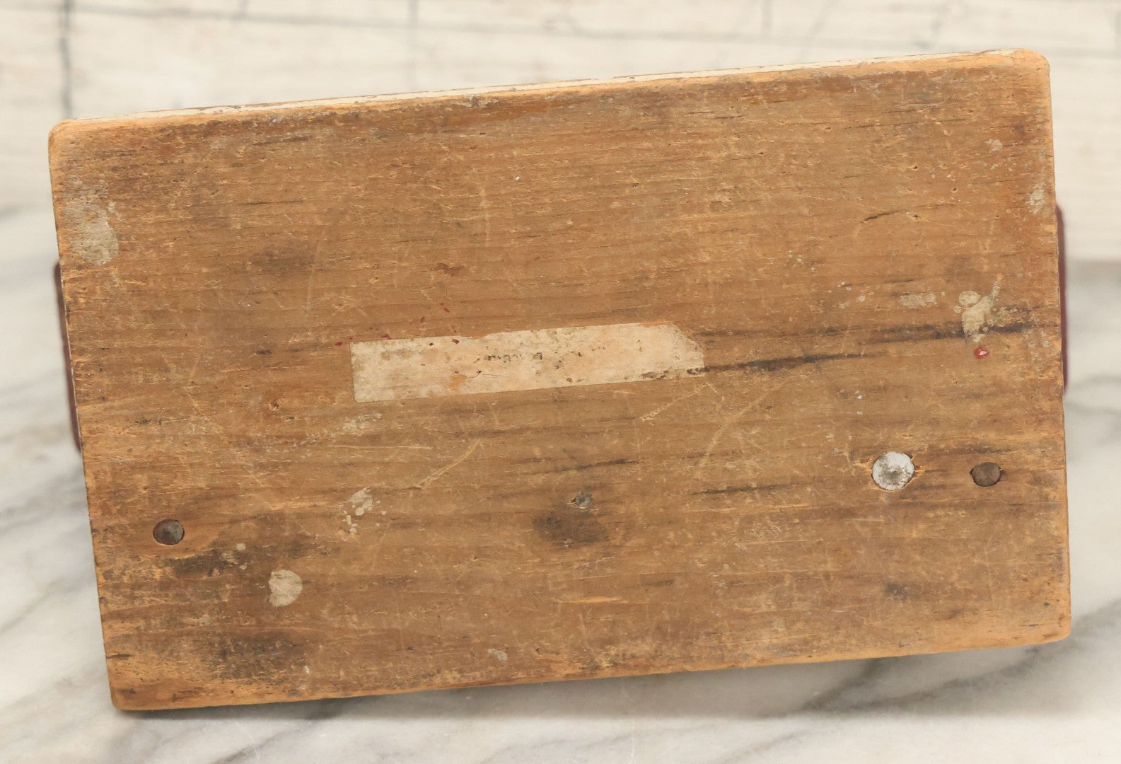 Lot 025 - Vintage Folk Art Boston Terrier Hand Painted, Hand Cut Wooden Door Stop With White House, Red Roof, Single Dog With Collar And Chain, Note Damaged Foot