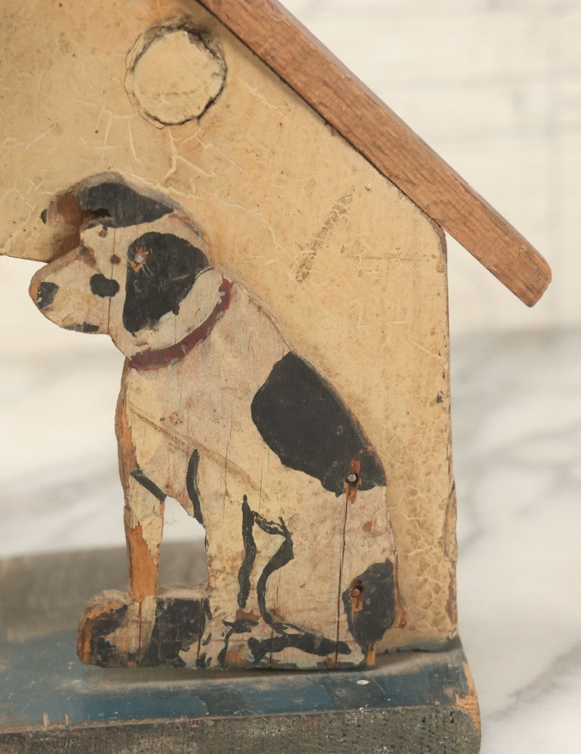 Lot 026 - Vintage Folk Art Spotty Dog Hand Painted, Hand Cut Wooden Door Stop With White House, Red Roof, Note Damage To Roof