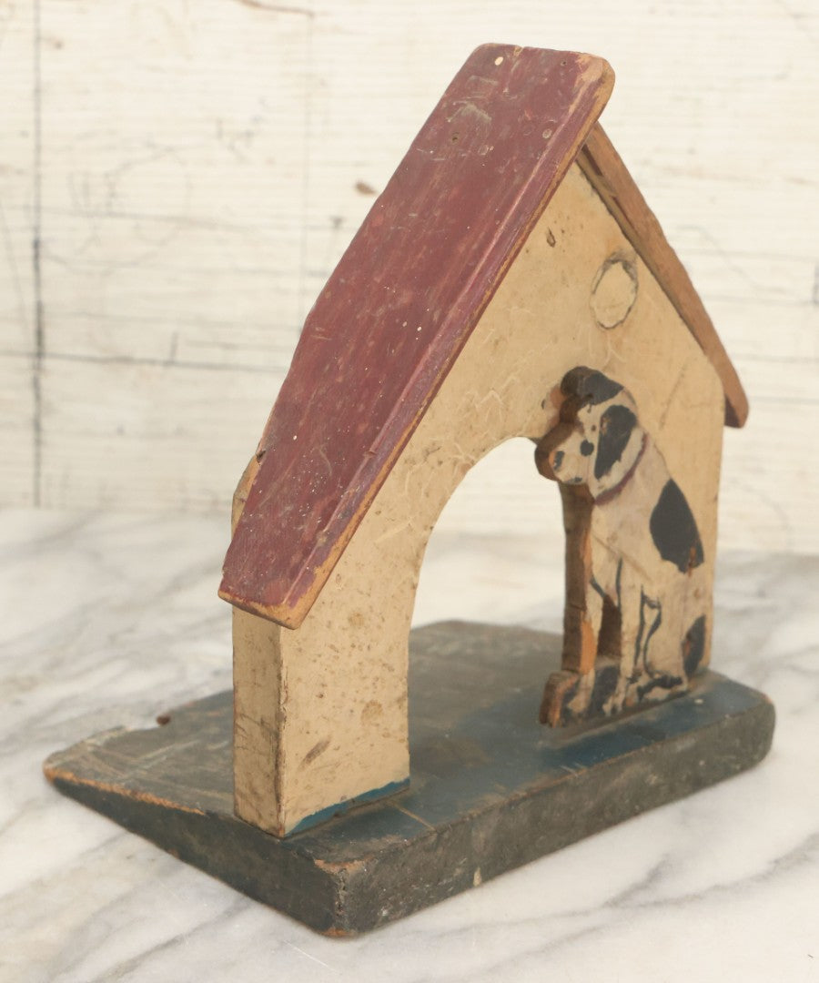 Lot 026 - Vintage Folk Art Spotty Dog Hand Painted, Hand Cut Wooden Door Stop With White House, Red Roof, Note Damage To Roof