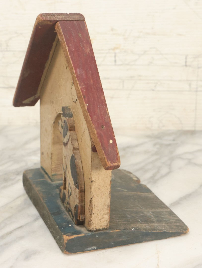 Lot 026 - Vintage Folk Art Spotty Dog Hand Painted, Hand Cut Wooden Door Stop With White House, Red Roof, Note Damage To Roof