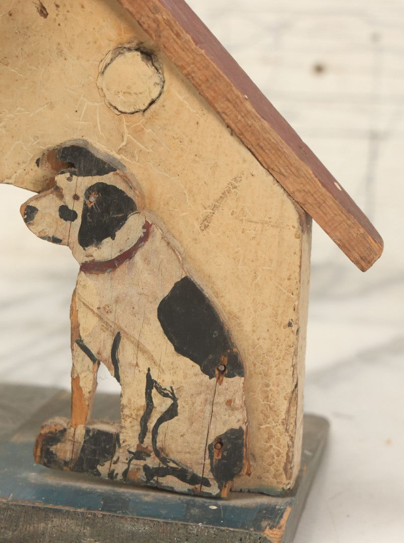 Lot 026 - Vintage Folk Art Spotty Dog Hand Painted, Hand Cut Wooden Door Stop With White House, Red Roof, Note Damage To Roof