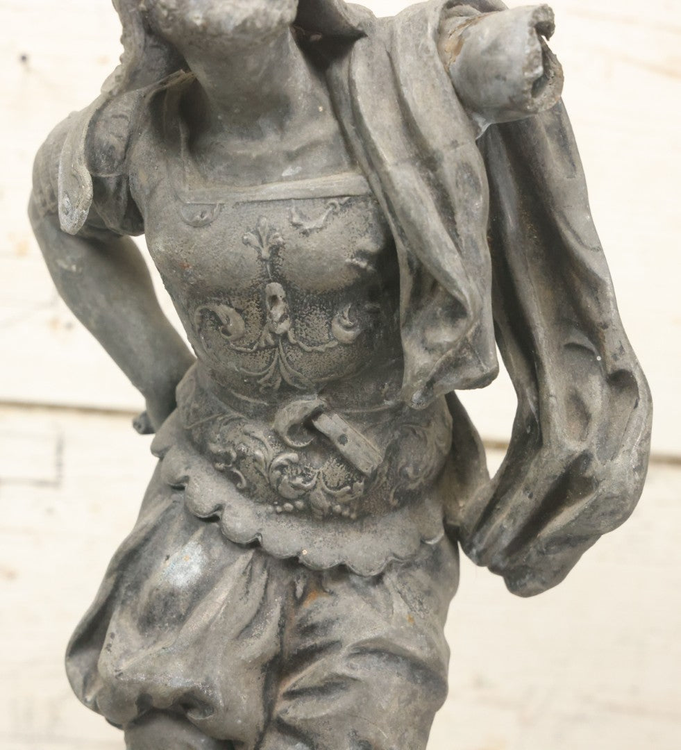 Lot 035 - Antique Spelter Metal Soldier Statue, Wearing Armor And Helmet, Note Missing Arm, Damaged / Warped Based, Overall Poor Condition, 16-1/2" Height