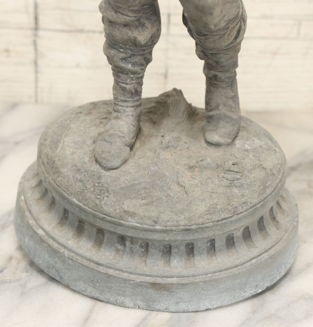 Lot 035 - Antique Spelter Metal Soldier Statue, Wearing Armor And Helmet, Note Missing Arm, Damaged / Warped Based, Overall Poor Condition, 16-1/2" Height